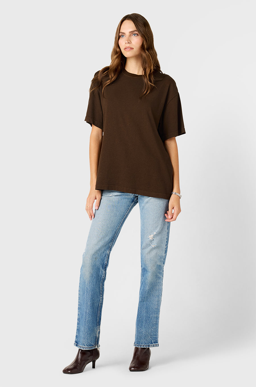 Model wearing The Lady & The Sailor Slouchy Tee in Chocolate - a brown tee with relaxed fit and soft drape.