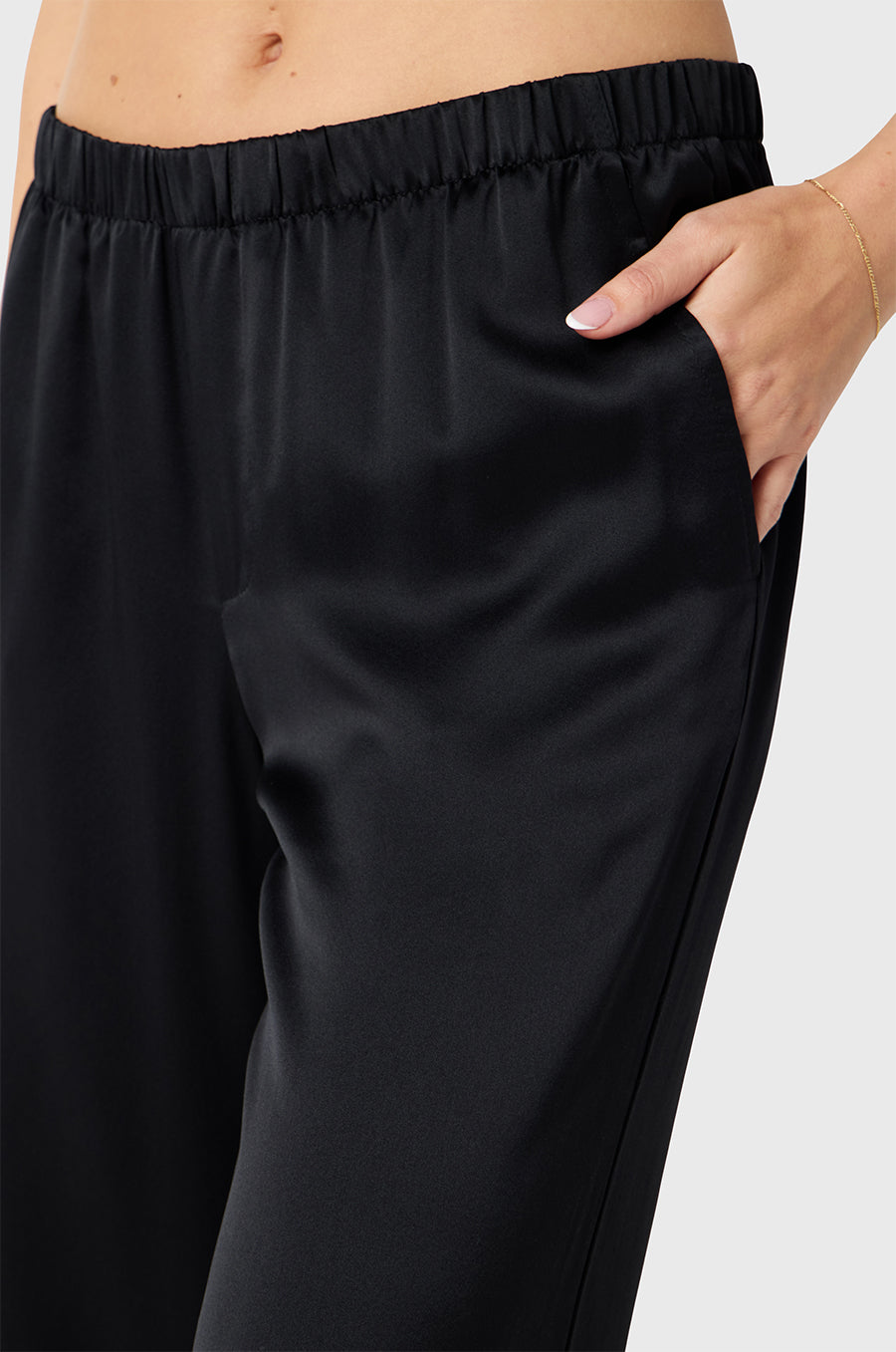 Brunette model wearing the lady & the sailor Wide Leg Pant in Black Silk
