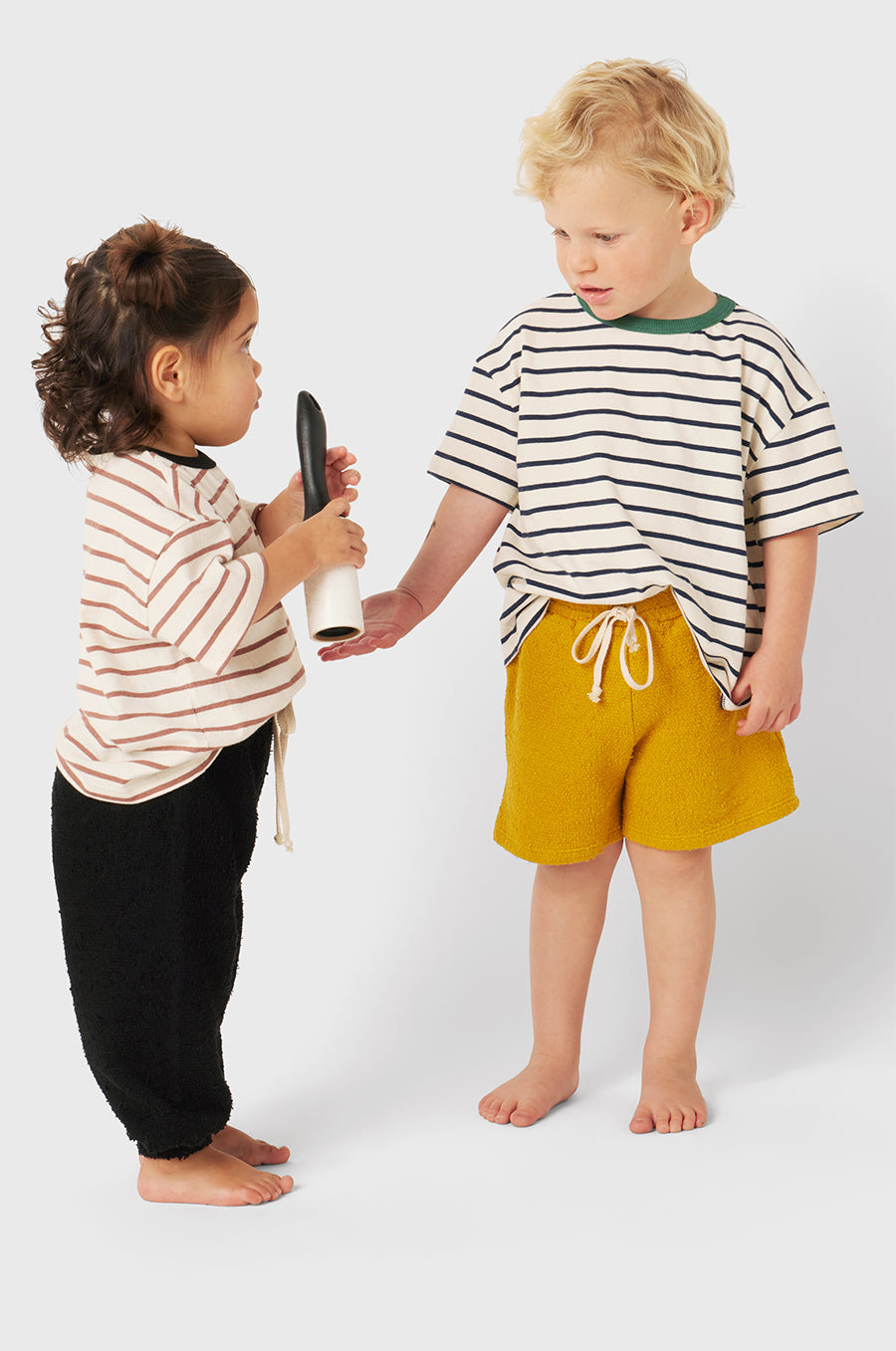 Model wearing Kids Weekend Short in Marigold Bouclé little lady & petit sailor