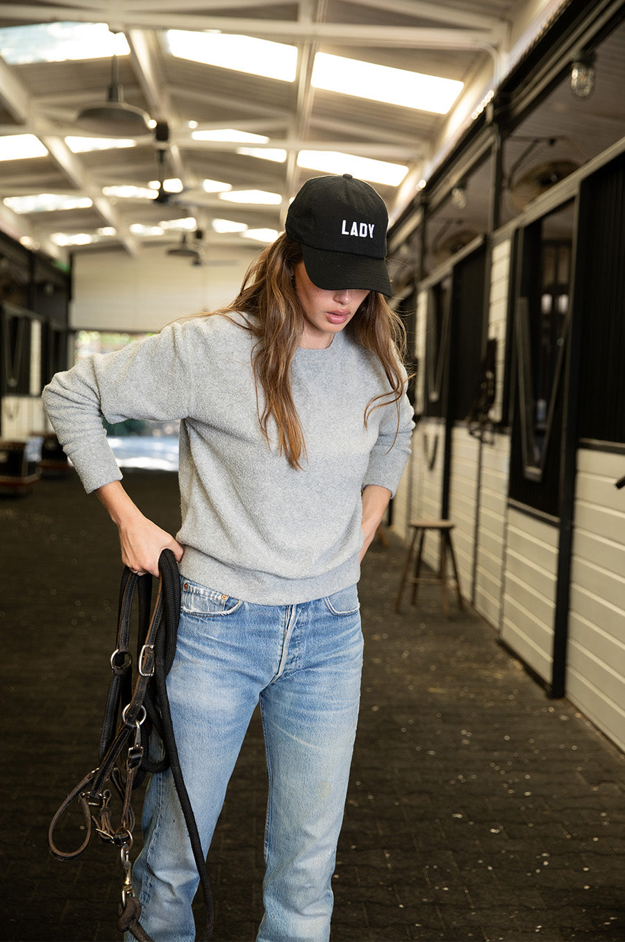 Brunette model wearing the lady & the sailor Lady Baseball Cap in Black and White.